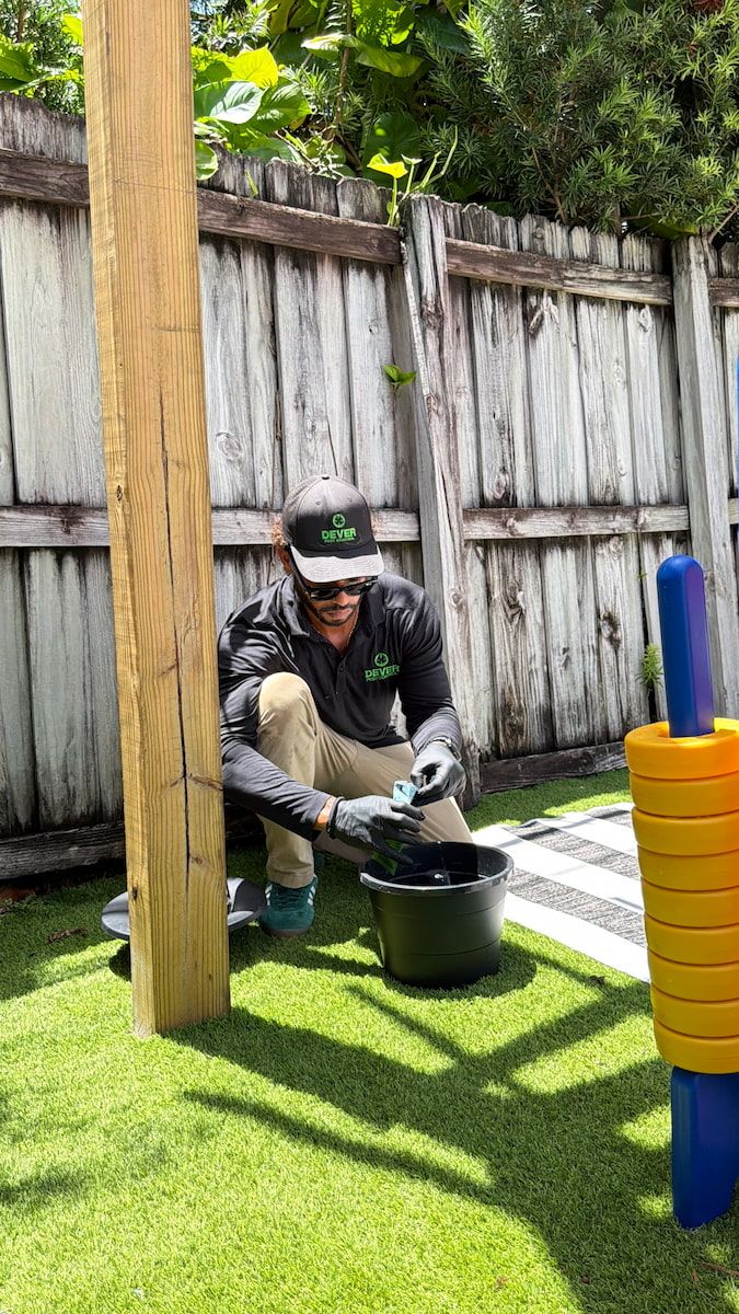 Mosquito fogging treatment in a South Florida yard